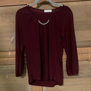 Jon & Anna maroon shirt